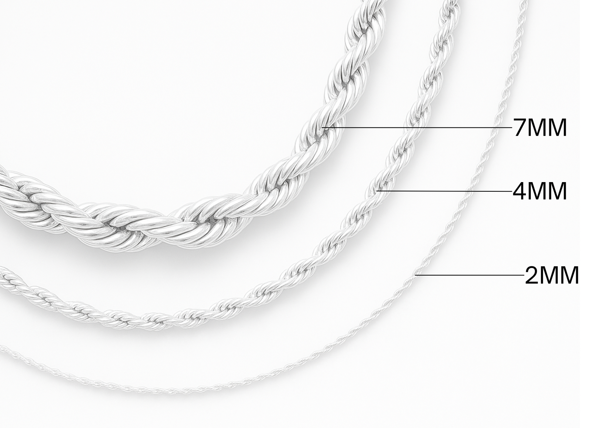 Three silver chains of different thicknesses on a white background