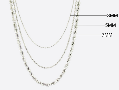 Three silver chains of different widths on a white background
